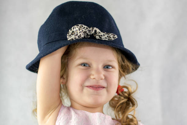 istock Little girl wearing a hat 1127117039
