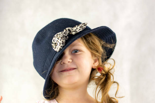 istock Little girl wearing a hat 1127117058