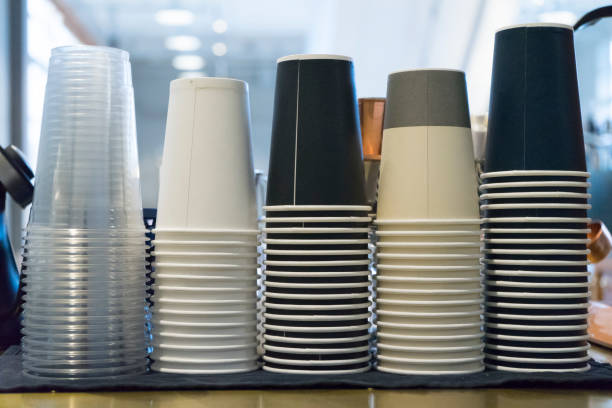 take-out coffee cups piled up by type - food currency breakfast business imagens e fotografias de stock