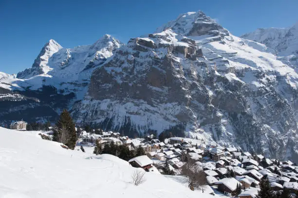 Winter wonderland on a beautiful sunny day in the swiss alps, above the mountain village  murren.