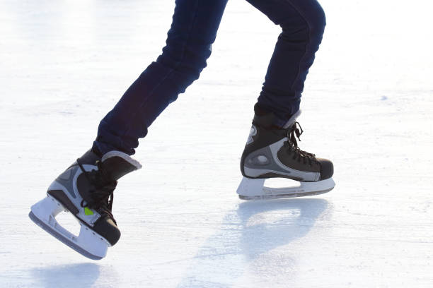 istock Feet skating on the ice rink 1127125482