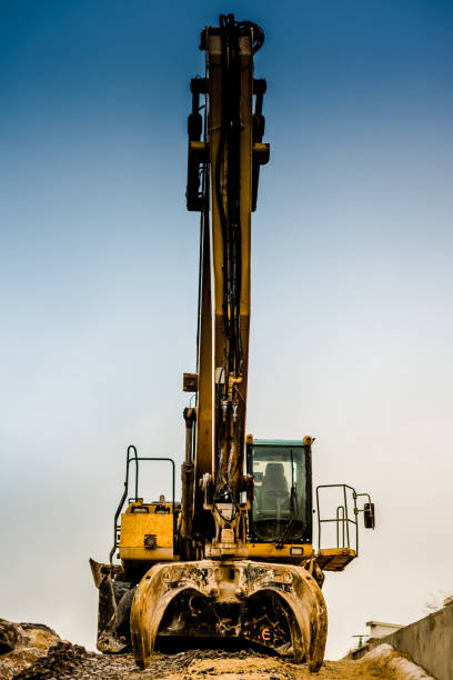 Detail of a yellow excavator scoop