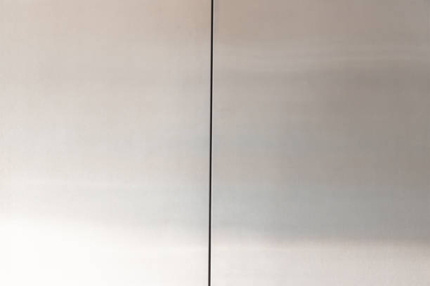 istock elevator door background and texture. stainless steel wall. 1127126759