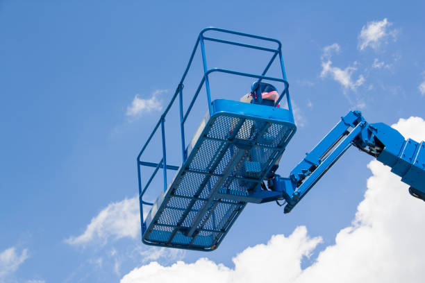 istock Lift buckets machine against blue sky 1127126797