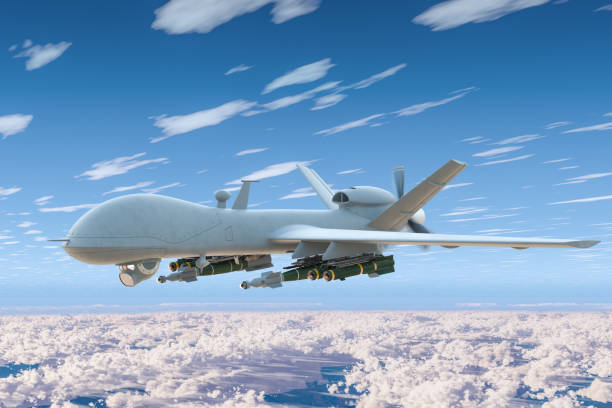 istock Combat drone fly in the blue sky above the clouds. 3D rendering 1127127698
