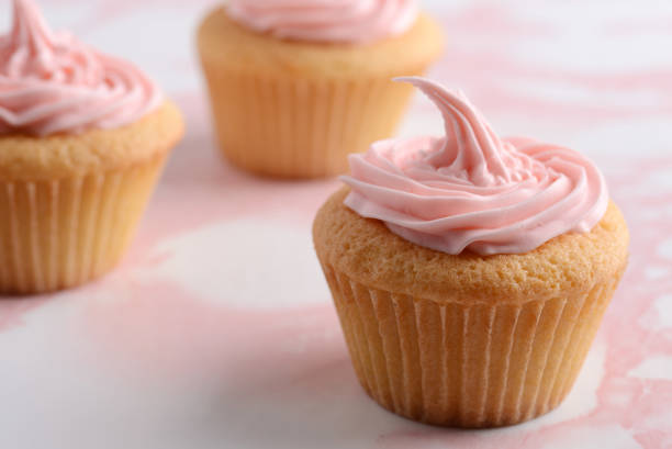 istock closeup pink cupcake with shallow DOF 1127128242