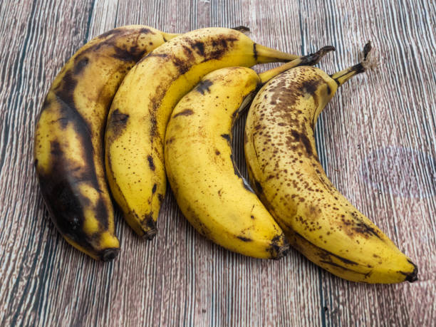 istock Ripe bananas, four on a table ready to eat 1127128249