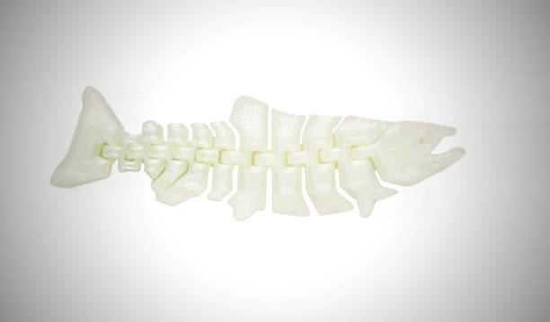 istock Bright light white object in shape of fish toy printed on 3d pri 1127129271