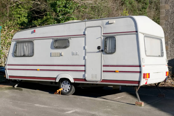 istock Old caravan dumped broken at roadside by travellers gypsies environmental pollution 1127130205
