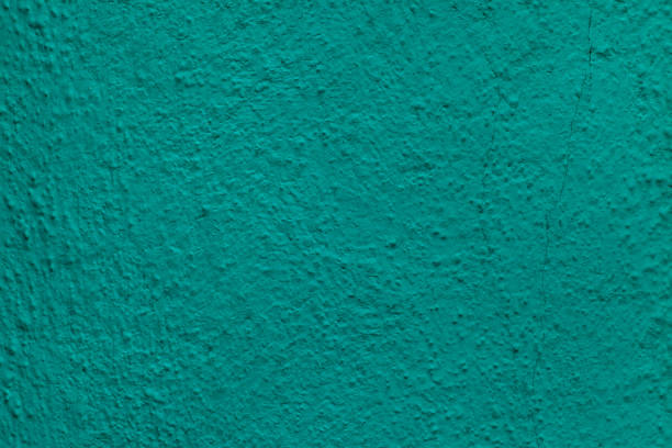 istock Emerald green painted stucco wall. Background texture. 1127133527