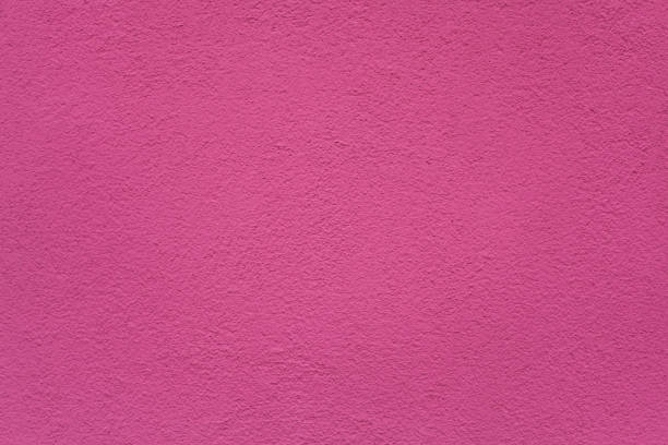 istock Pink painted stucco wall. Background texture. 1127133569