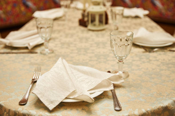 istock metal fork and knife on wooden table 1127136622