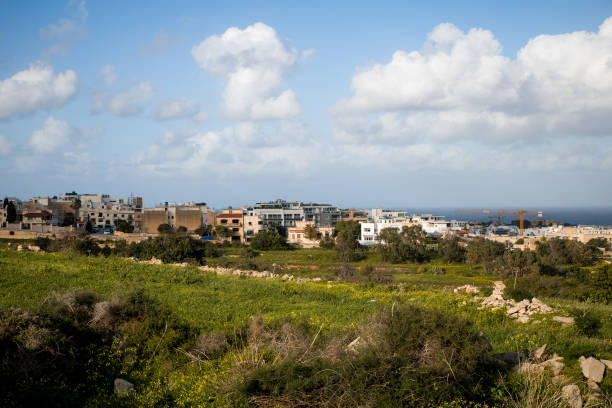 Construction in Malta threatening the last few patches of countryside left stock photo