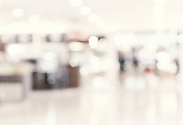 blur inside shopping mall with bokeh light background - lifestyles designer store luxury imagens e fotografias de stock