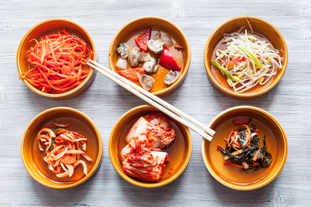 istock chopsticks above various appetizers in bowls 1127140241