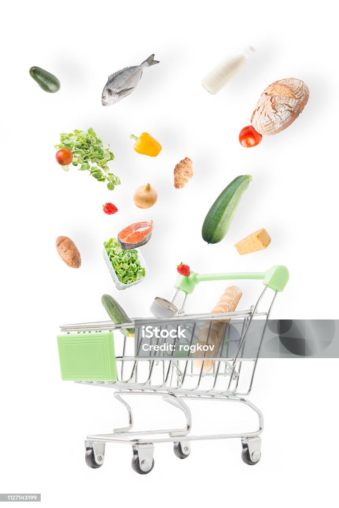 Food basket. The falling food in a basket.Healthy diet. Avocado Stock Photo