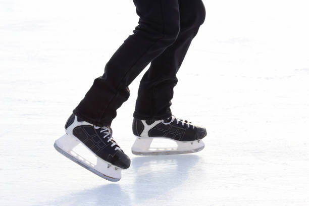 istock Feet skating on the ice rink 1127143314