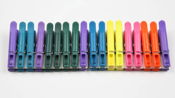 istock Colored clothespins for clothes on a white background 1127143572