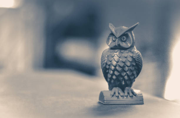 istock The green form in the form of a small owl created on 3d printer 1127143620