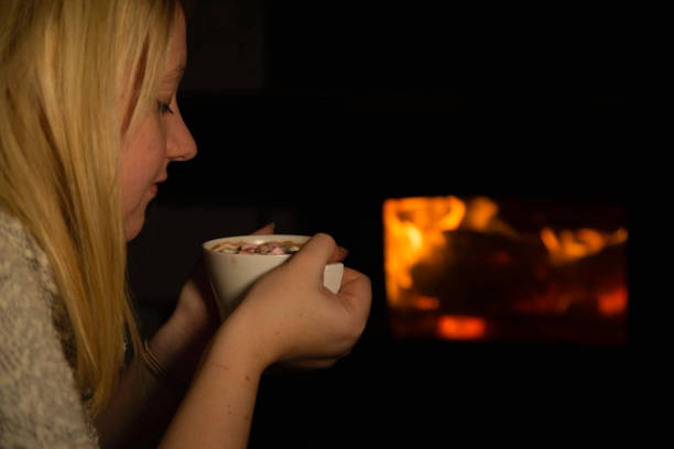 istock young blond woman drinking hot chocolate 1127145208