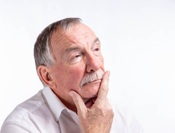 istock handsome senior man high key portrait 1127146147