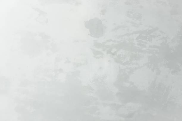 istock White washed painted textured abstract background with brush paint strokes in white and black shades. Abstract painting backgrounds. 1127146227