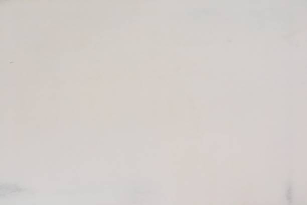 istock White washed painted textured abstract background with brush paint strokes in white and black shades. Abstract painting backgrounds. 1127146230