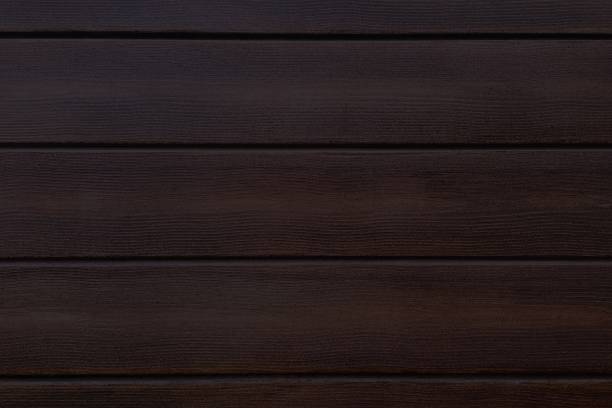 istock black wood background, dark wooden texture background 1127146281