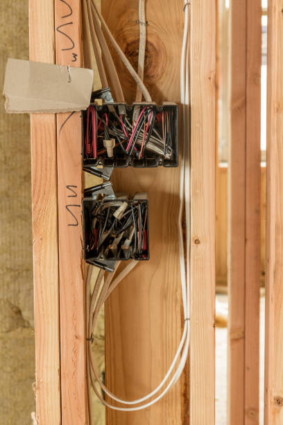 istock Two electrical boxes mountain to a wall in new home constriction 1127146287