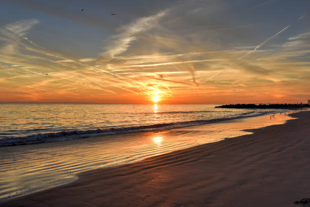 istock Coney Island Beach at Sunset. 1127146544