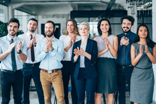 istock Audience Applauding Speaker At Business Conference 1127146823