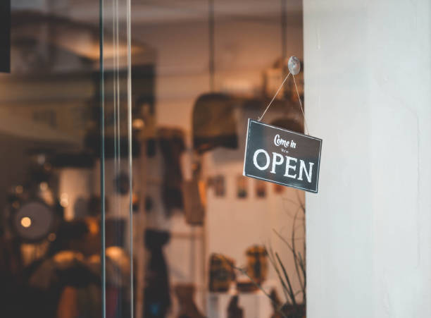 istock Sign is open on the store. Come in we're open sign 1127150945