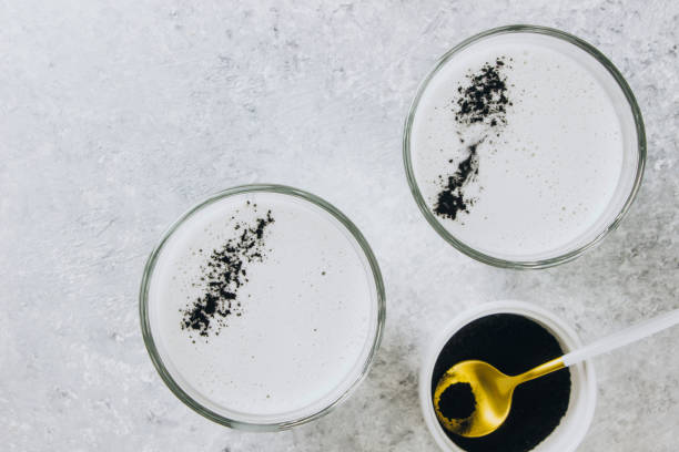 istock Black charcoal latte. Detox drink. Selective focus 1127152355