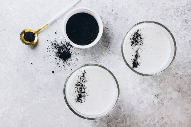 istock Black charcoal latte. Detox drink. Selective focus 1127152360