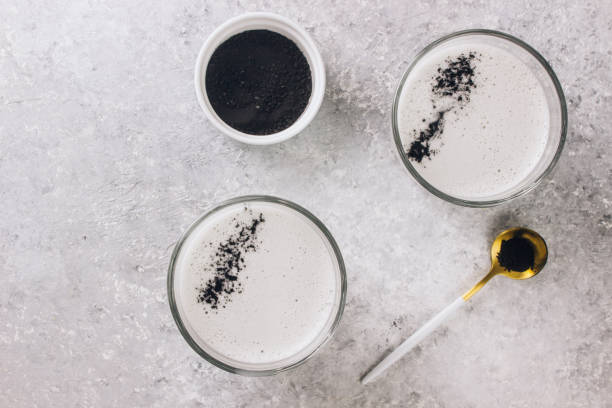 istock Black charcoal latte. Detox drink. Selective focus 1127152363