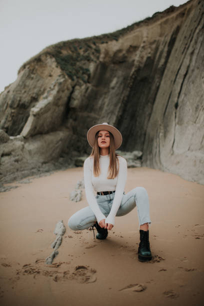istock Young woman portrait at beach 1127152714