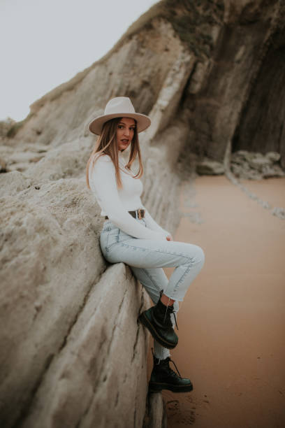 istock Young woman portrait at beach 1127152715