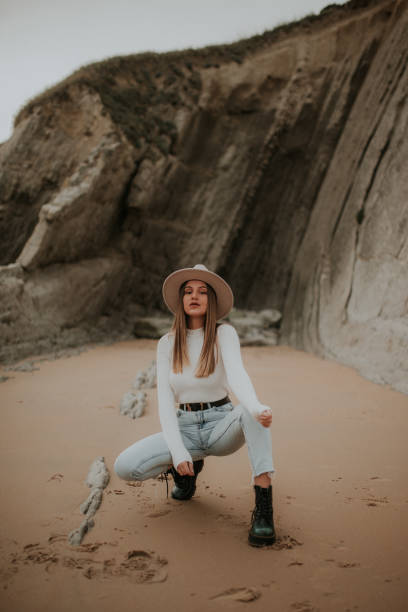 istock Young woman portrait at beach 1127152716