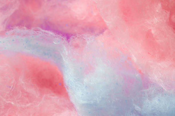 cotton candy trend color of the year, coral and purple background, cotton candy candyfloss stock pictures, royalty-free photos & images