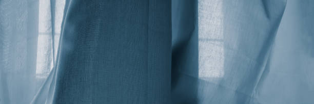 istock windows in the room closed curtains. 1127156533
