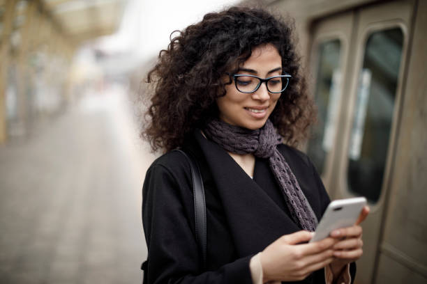 istock Young woman waiting for the subway train 1127157598