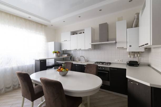 istock Interior. Kitchen modern, white, brown, beige color, fruits and vegetables 1127157735