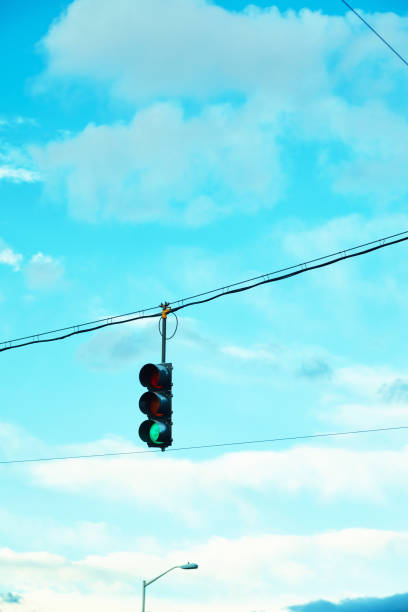 istock Traffic lights shot in early morning light showing green light 1127157792