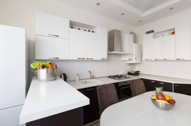 istock Interior. Kitchen modern, white, brown, beige color, fruits and vegetables 1127157841