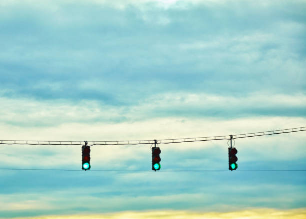 istock Traffic lights shot in early morning light showing green light 1127157991