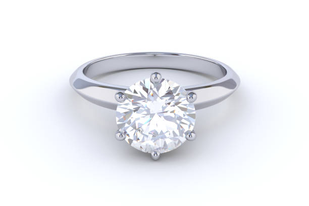 istock Solitaire diamond engagement ring isolated on white background 1127158662