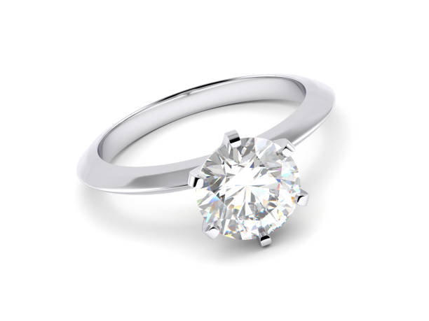 istock Solitaire diamond engagement ring isolated on white background 1127158663