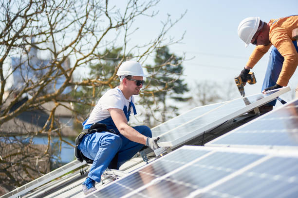 installing solar photovoltaic panel system on roof of house - solar power station solar panel energy electrician imagens e fotografias de stock