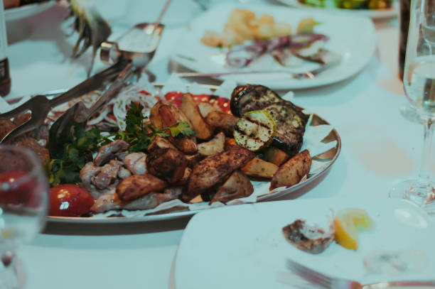istock Wedding banquet table with food 1127159318
