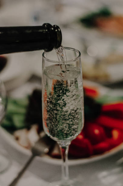 istock Champagne with bottle on the wedding table 1127159344